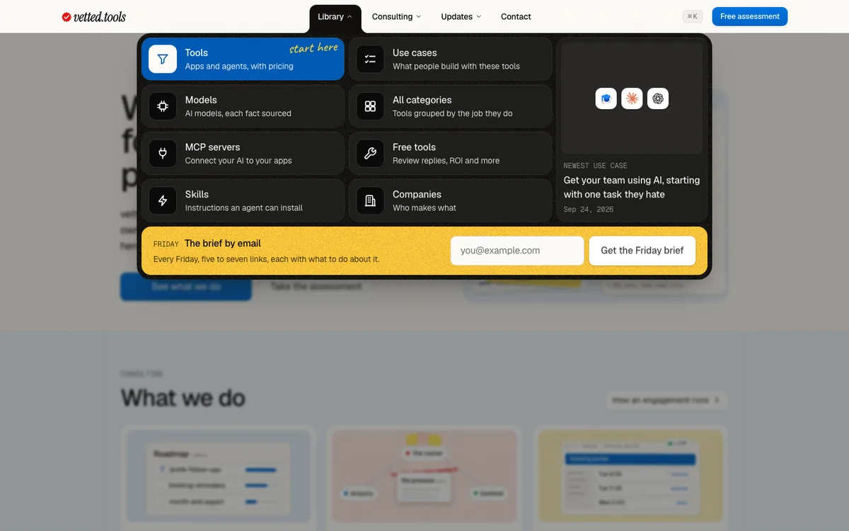 The Library menu open over the home page: a black panel of black icon tiles, the Tools card in blue marked start here, a sunflower strip for the Friday brief, and the page dimmed behind it.