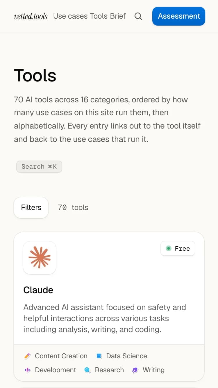 The tool directory on a 375px screen: a card per tool instead of a table row.