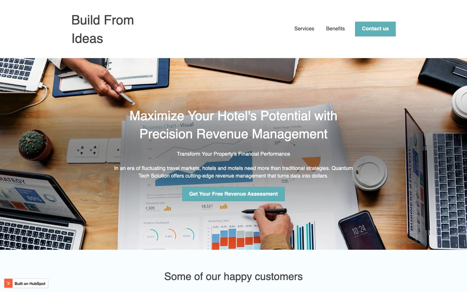 The Build From Ideas homepage on the .com domain, from an April 2025 archive capture. A white bar carries the stacked wordmark with Services, Benefits and a teal 'Contact us' button, over a stock photograph of hands writing on printed revenue charts between two laptops. White type reads 'Maximize Your Hotel's Potential with Precision Revenue Management' over a paragraph naming Quantum Tech Solution and a teal 'Get Your Free Revenue Assessment' button, above a band headed 'Some of our happy customers' and a 'Built on HubSpot' badge in the corner.